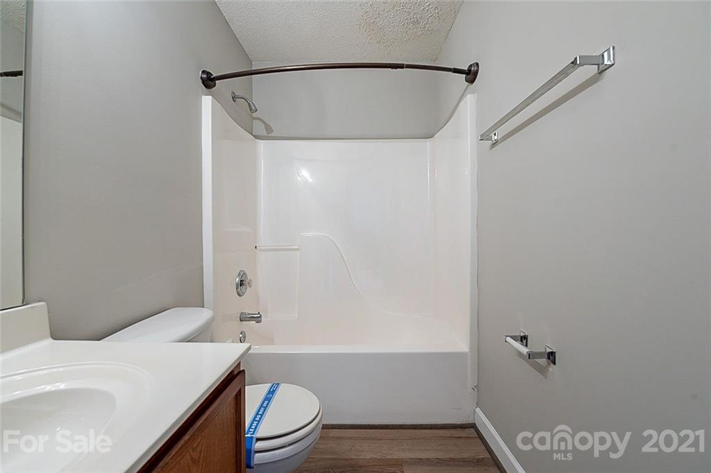 1665 Tate Road Rock Hill, SC 29732 - Photo 6 of 16 a bathroom with a sink a toilet and shower