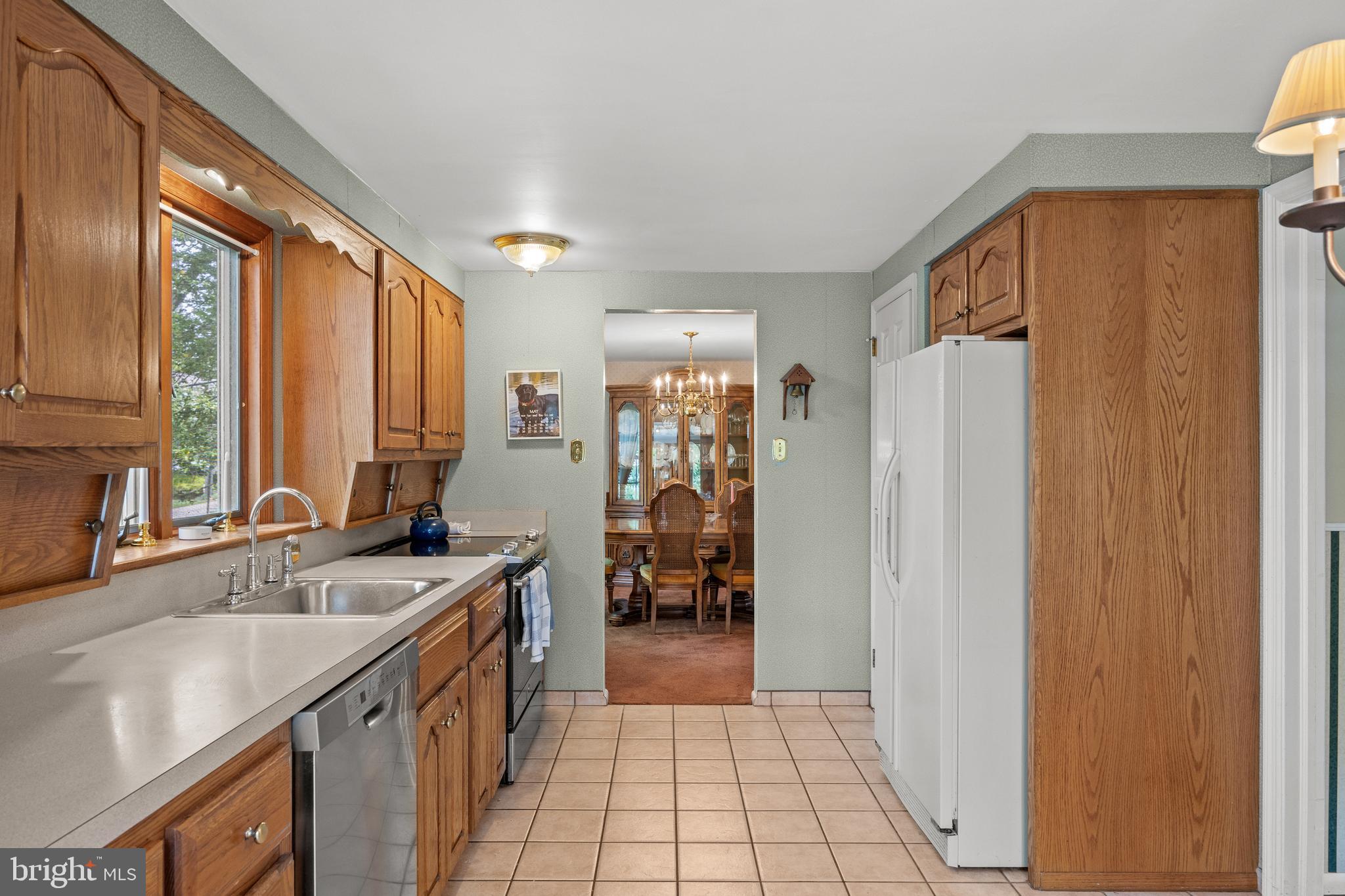 100 Sawmill Road Cherry Hill, NJ 08034 - Photo 12 of 35 a kitchen with a sink a refrigerator and a sink