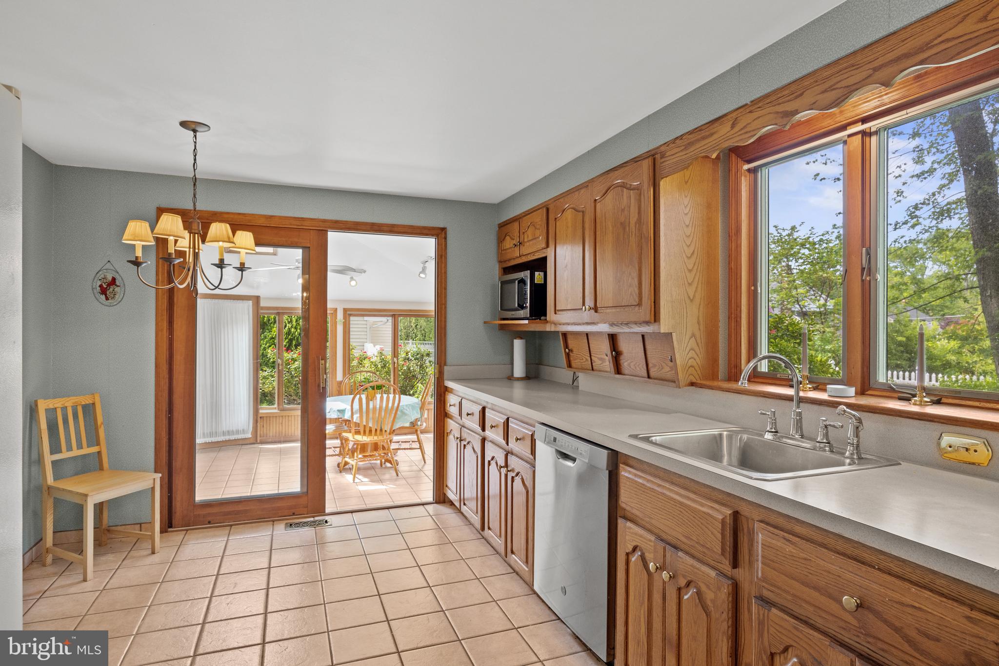 100 Sawmill Road Cherry Hill, NJ 08034 - Photo 10 of 35 a kitchen with a sink large window appliances and cabinets