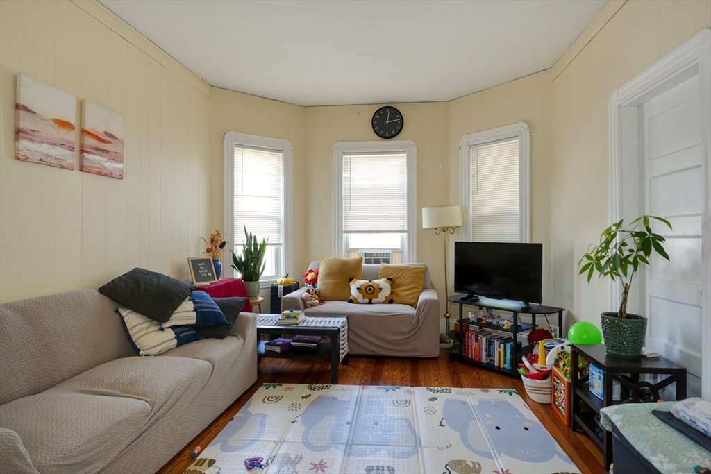 99 Beech Street Belmont, MA 02478 - Photo 16 of 37 a living room with furniture and a flat screen tv