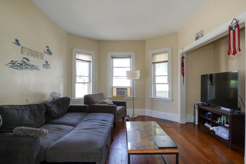 99 Beech Street Belmont, MA 02478 - Photo 26 of 37 a living room with furniture and a flat screen tv