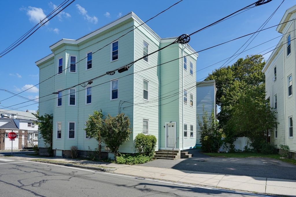 99 Beech Street Belmont, MA 02478 - Photo 33 of 37 a front view of a house with a yard