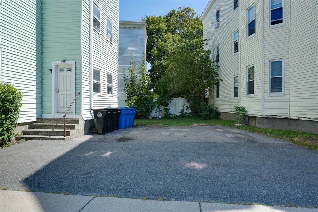 99 Beech Street Belmont, MA 02478 - Photo 34 of 37 a view of a house with a yard
