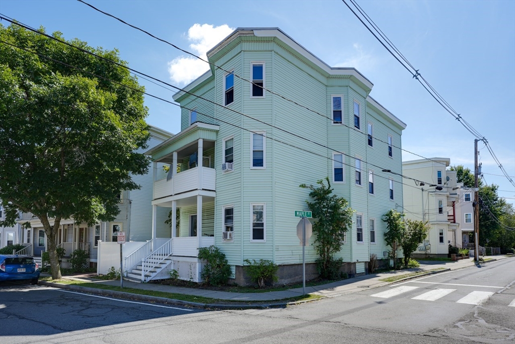 99 Beech Street Belmont, MA 02478 - Photo 35 of 37 a front view of white house with a garden