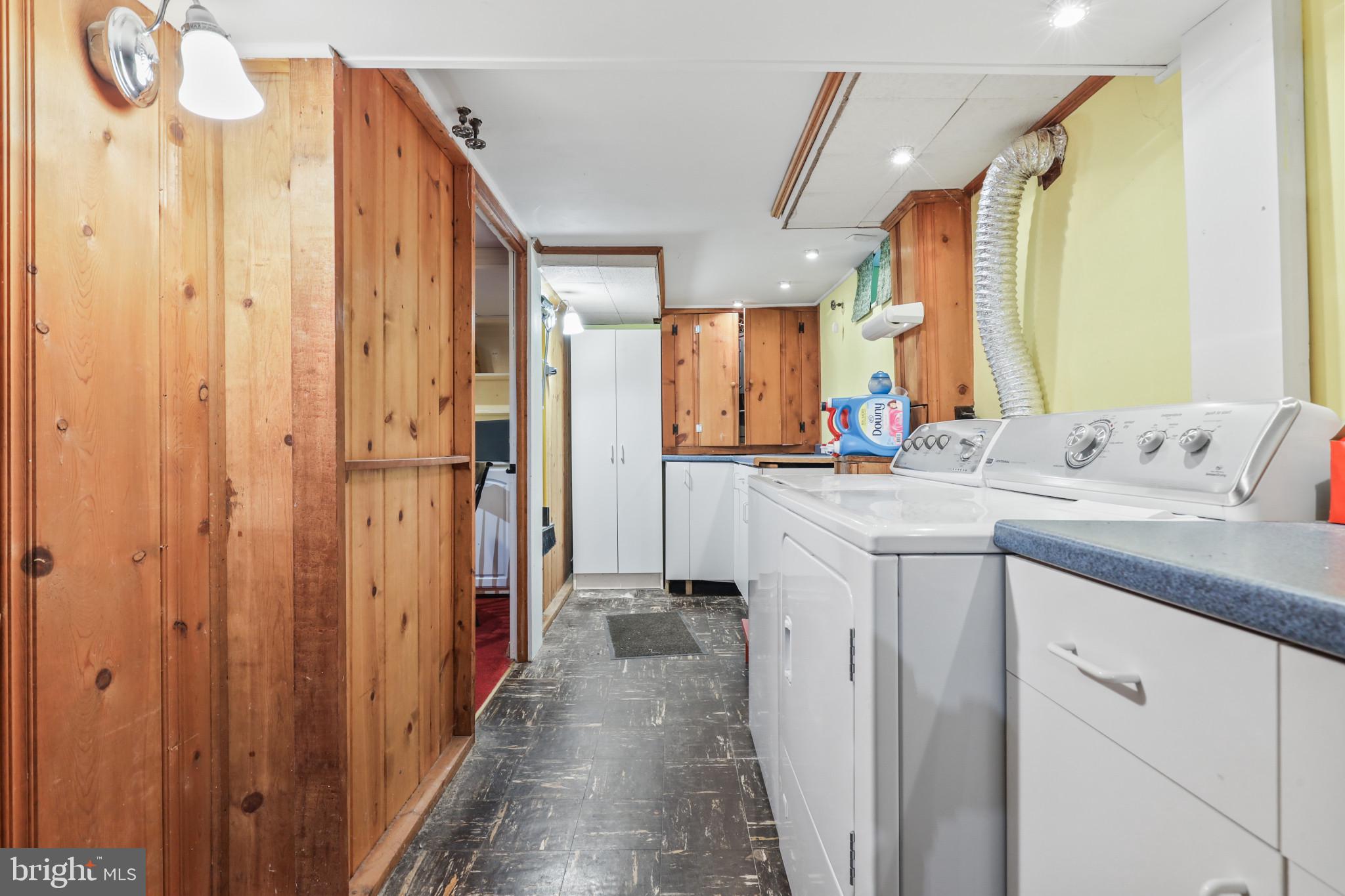 605 Piccadilly Road Towson, MD 21204 - Photo 50 of 62 Laundry with lots of cabinetry