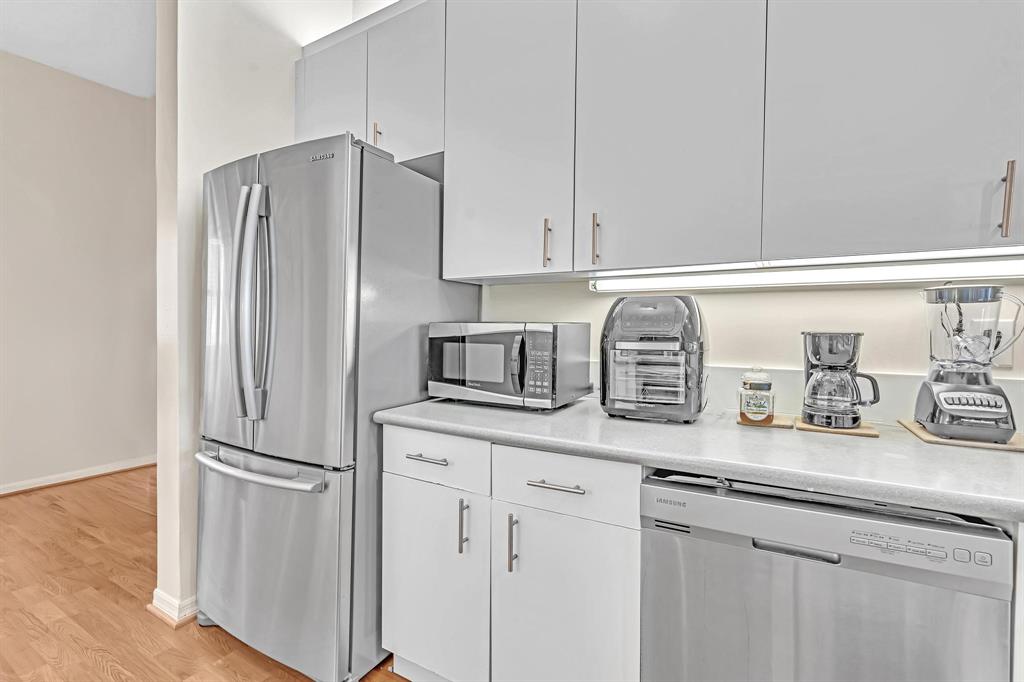 7802 Trent Drive, Unit 406 Fort Lauderdale, FL 33321 - Photo 3 of 70 a kitchen with appliances a sink and cabinets