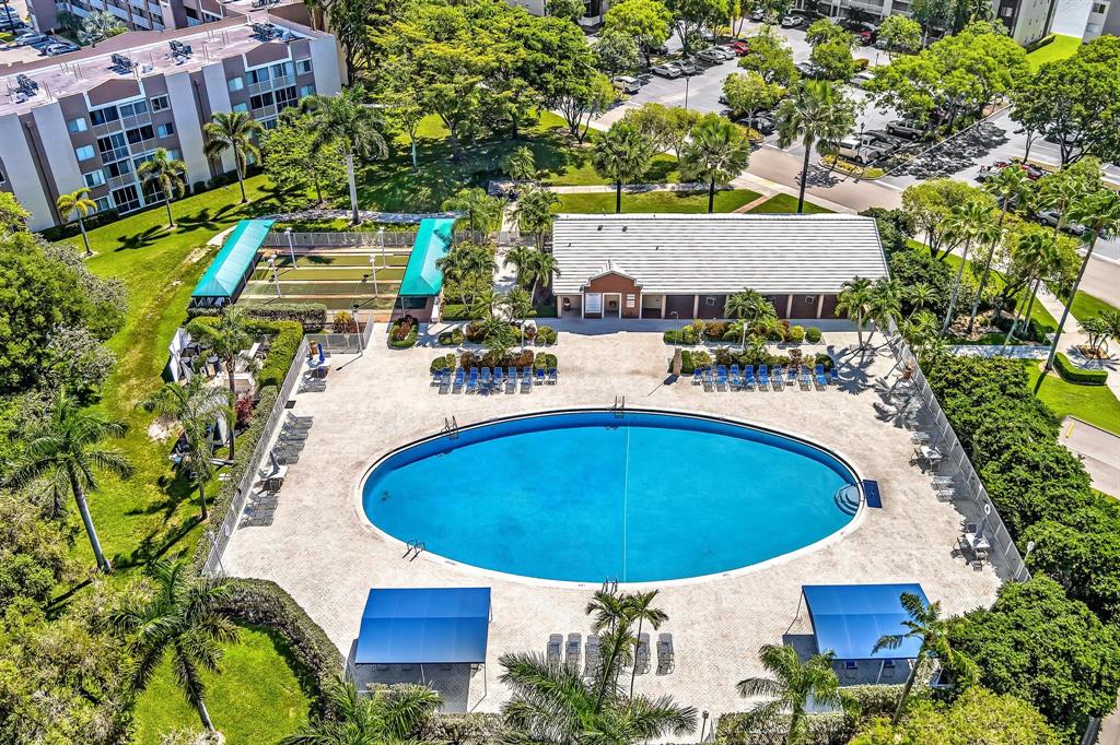 7802 Trent Drive, Unit 406 Fort Lauderdale, FL 33321 - Photo 42 of 70 an aerial view of a house with outdoor space patio and outdoor seating