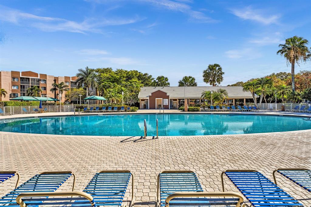 7802 Trent Drive, Unit 406 Fort Lauderdale, FL 33321 - Photo 44 of 70 a view of house with yard and lake view