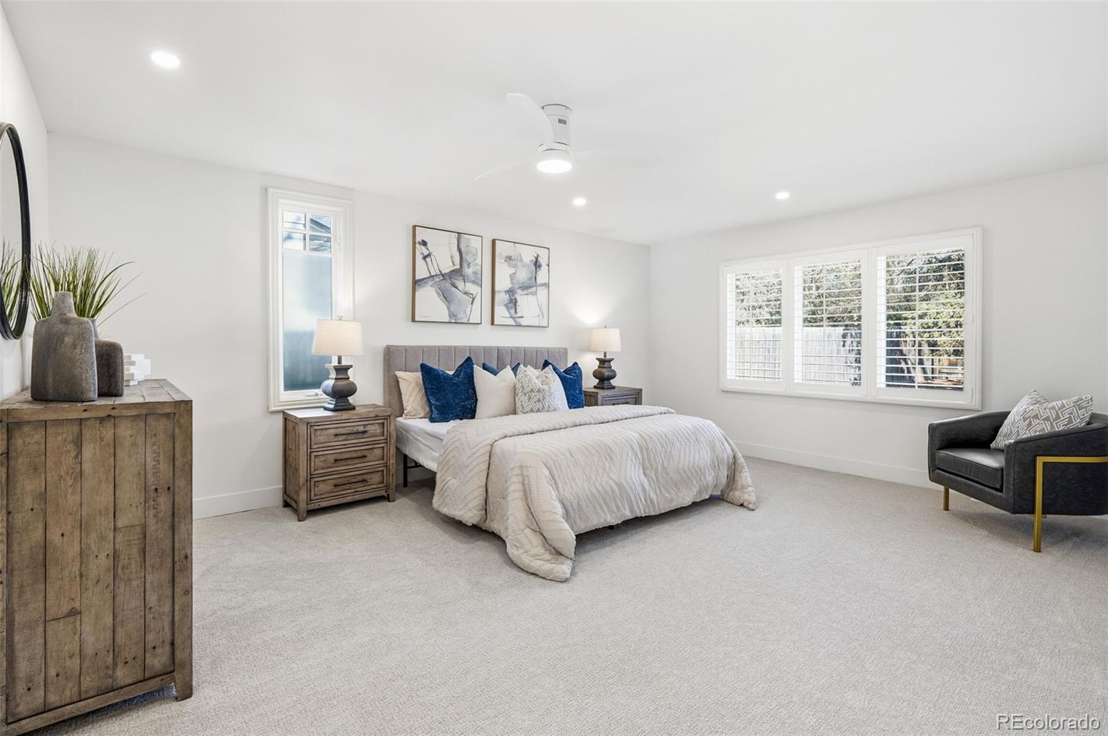 4788 Briar Ridge Trail Boulder, CO 80301 - Photo 16 of 42 a spacious bedroom with a bed and a couch