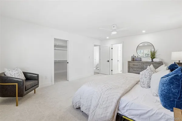 a bedroom with a bed and furniture