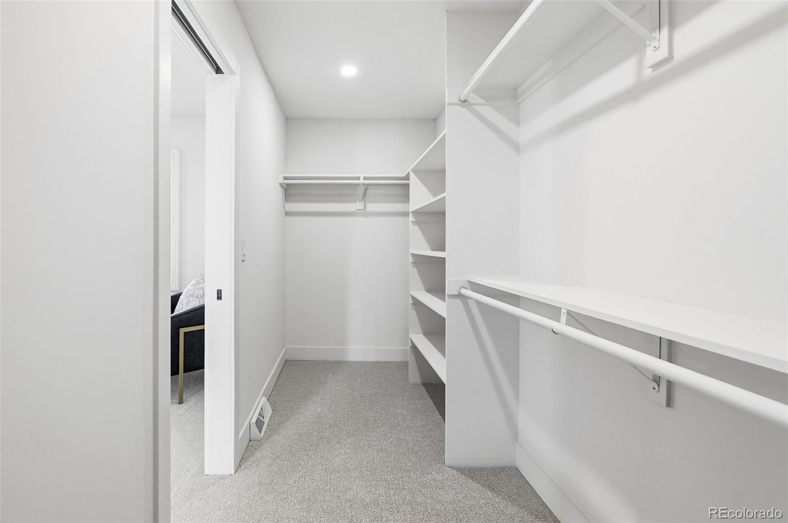 4788 Briar Ridge Trail Boulder, CO 80301 - Photo 19 of 42 a view of walk in closet with empty racks