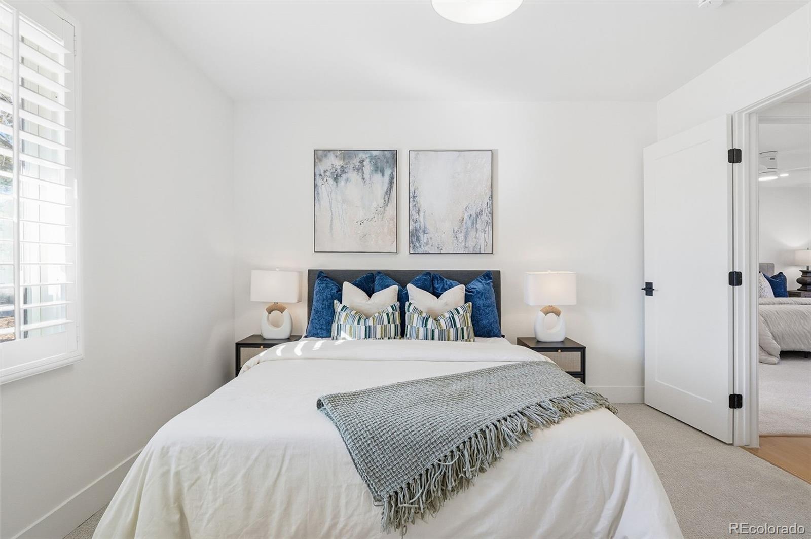 4788 Briar Ridge Trail Boulder, CO 80301 - Photo 23 of 42 a bedroom with a bed and a window