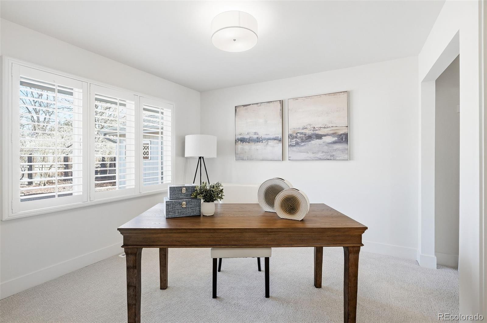 4788 Briar Ridge Trail Boulder, CO 80301 - Photo 25 of 42 a view of a workspace with a table and chairs