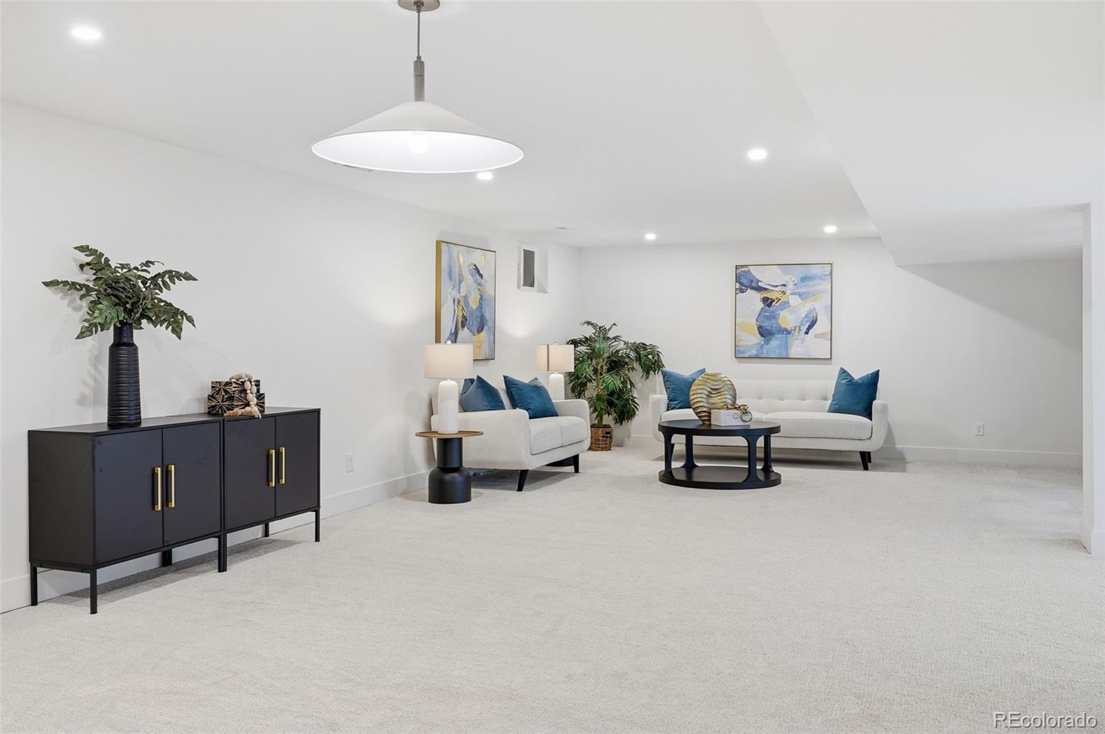4788 Briar Ridge Trail Boulder, CO 80301 - Photo 29 of 42 a living room with furniture and a potted plant