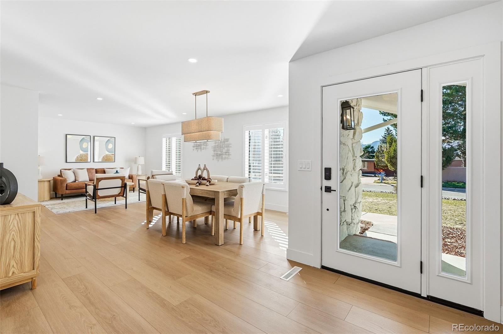 4788 Briar Ridge Trail Boulder, CO 80301 - Photo 4 of 42 a living room with furniture and a wooden floor