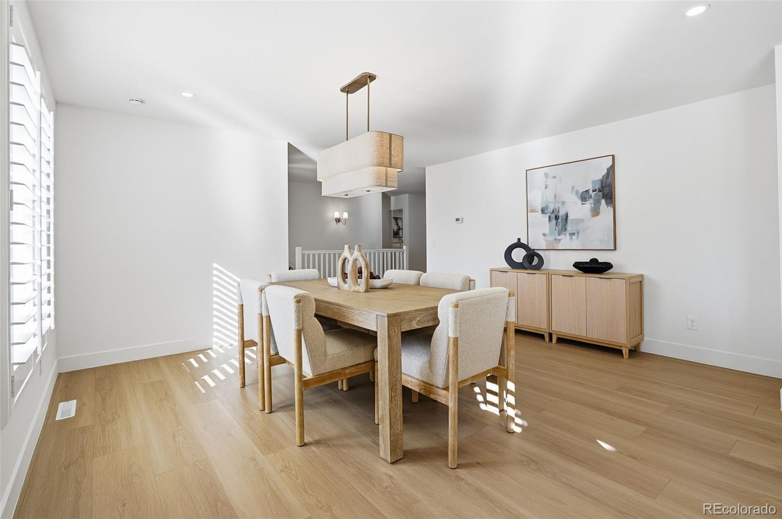 4788 Briar Ridge Trail Boulder, CO 80301 - Photo 9 of 42 a dining room with furniture and wooden floor