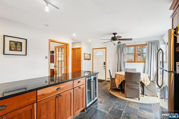a lobby with furniture and floor to ceiling window