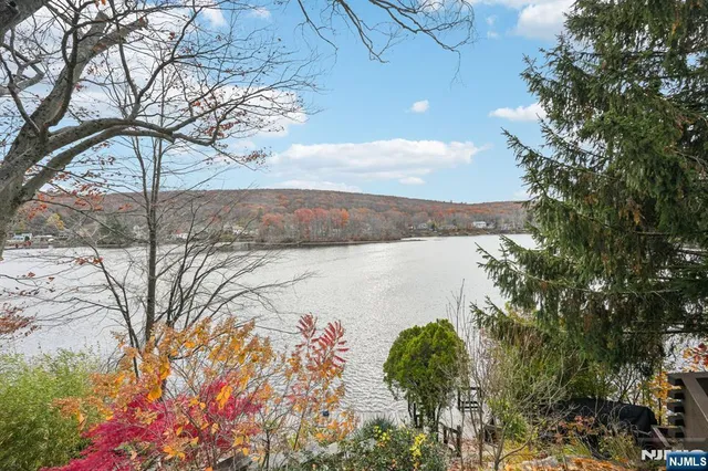 a terrace view with two chairs and a table