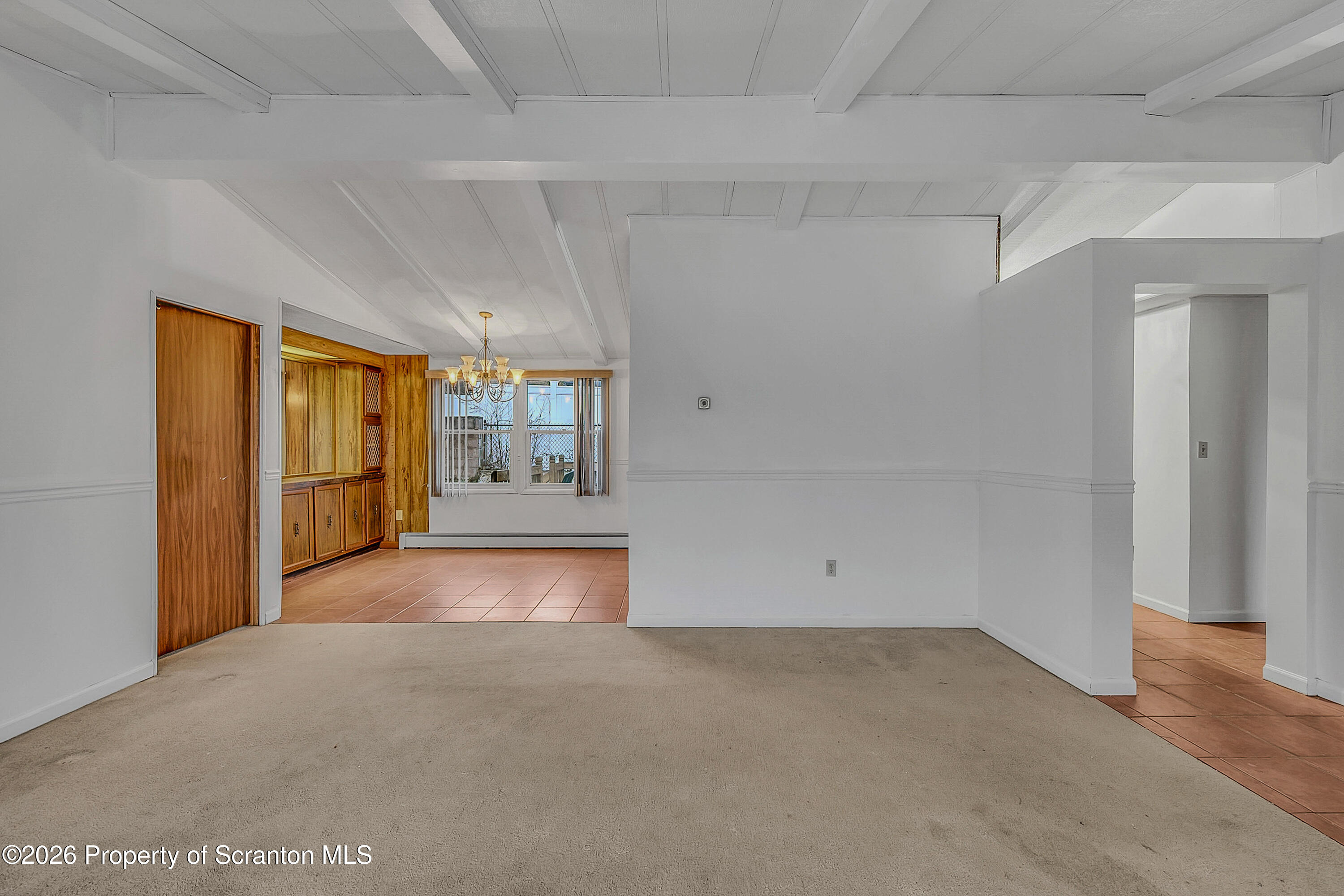 1050 Mark Avenue Dunmore, PA 18510 - Photo 11 of 35 wooden floor in an empty room with a window