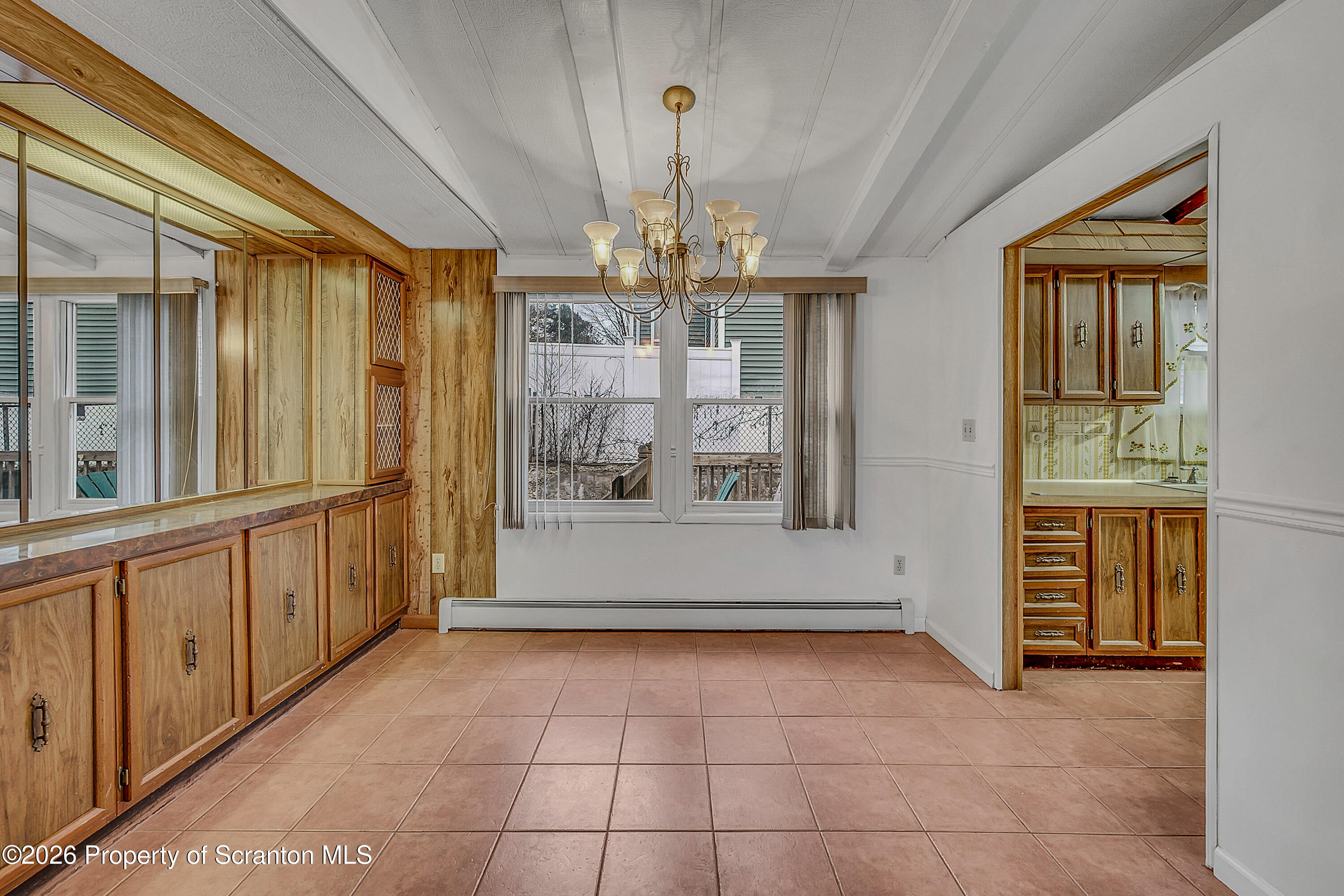 1050 Mark Avenue Dunmore, PA 18510 - Photo 12 of 35 a view of an entryway with chandelier