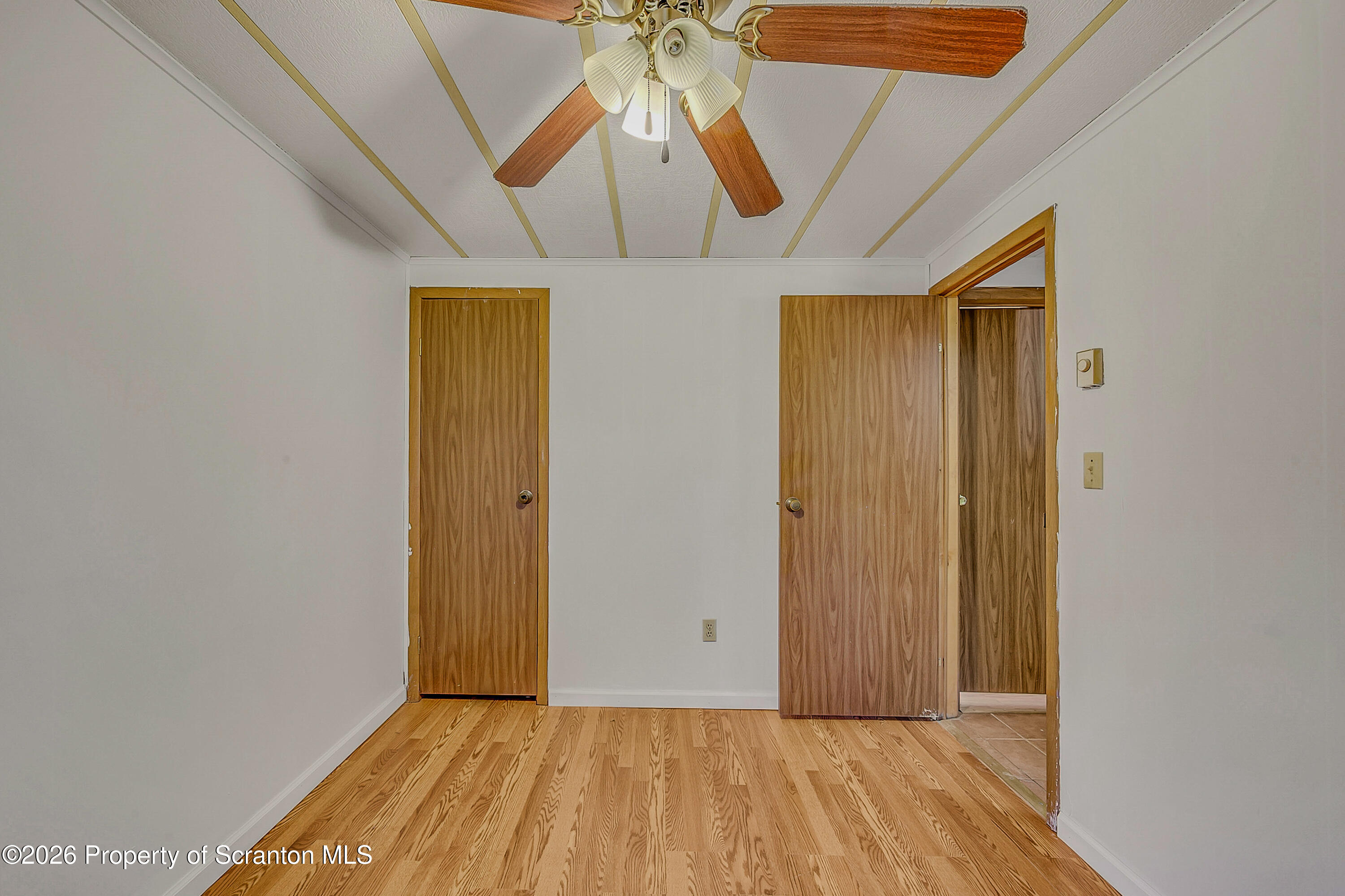 1050 Mark Avenue Dunmore, PA 18510 - Photo 25 of 35 a view of a hallway with wooden floor