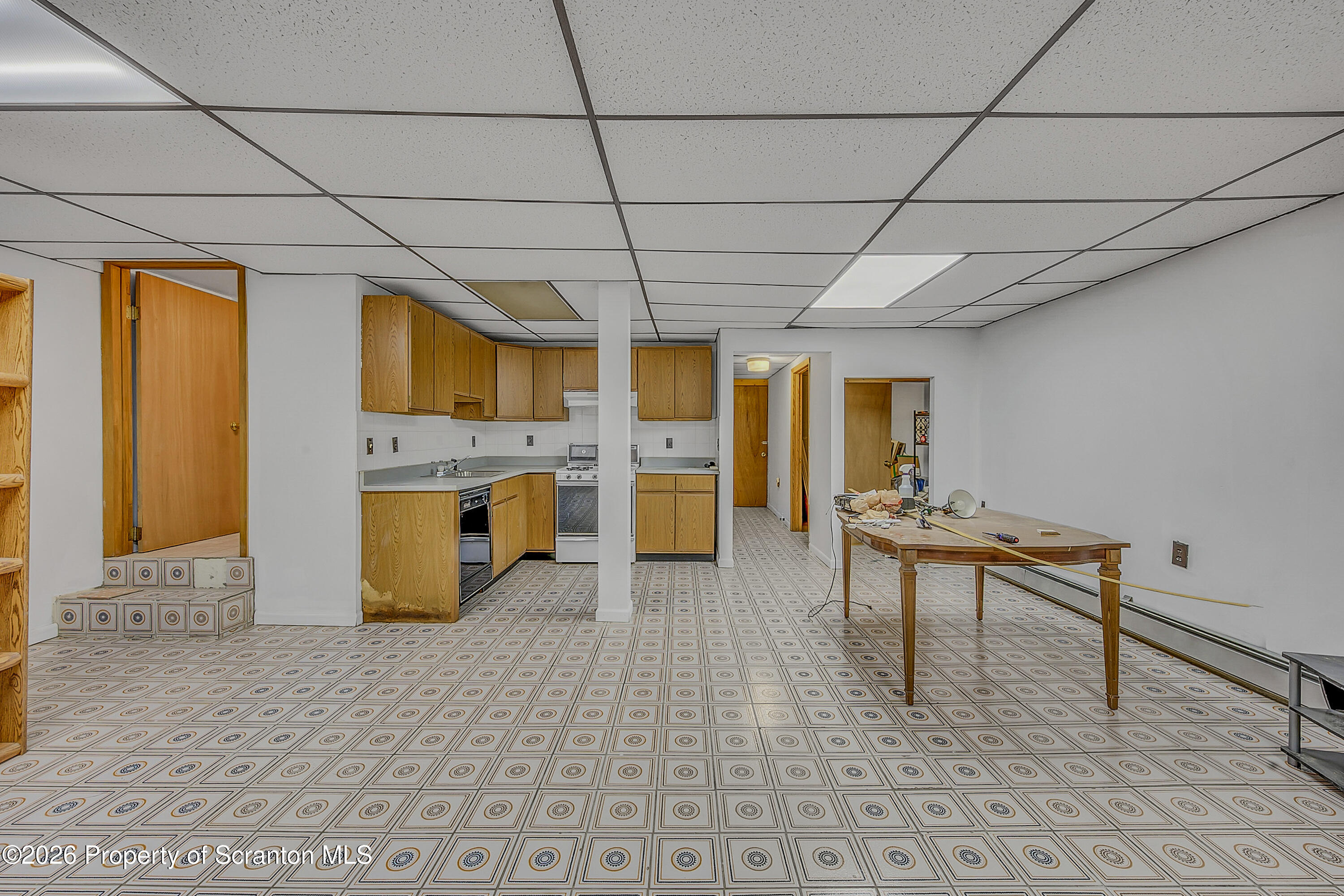 1050 Mark Avenue Dunmore, PA 18510 - Photo 31 of 35 a view of a livingroom with kitchen appliances and furniture