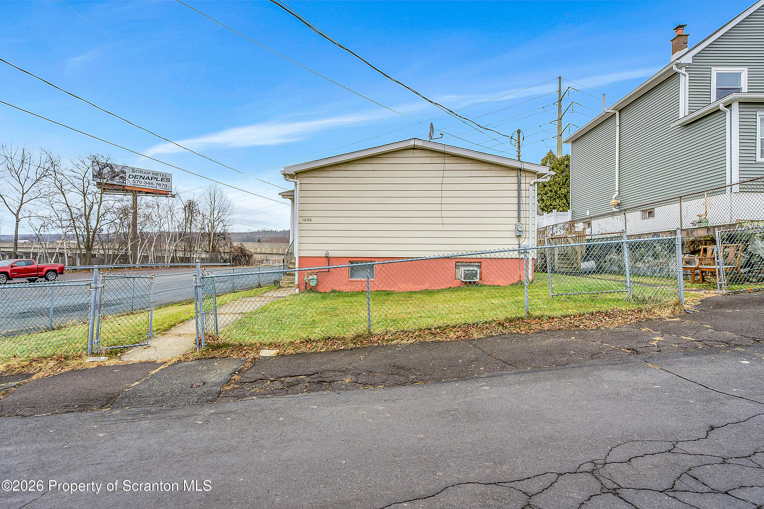 1050 Mark Avenue Dunmore, PA 18510 - Photo 4 of 35 a view of a backyard with basket ball court