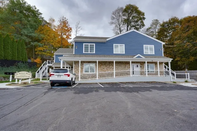 a sign on a pole on a street
