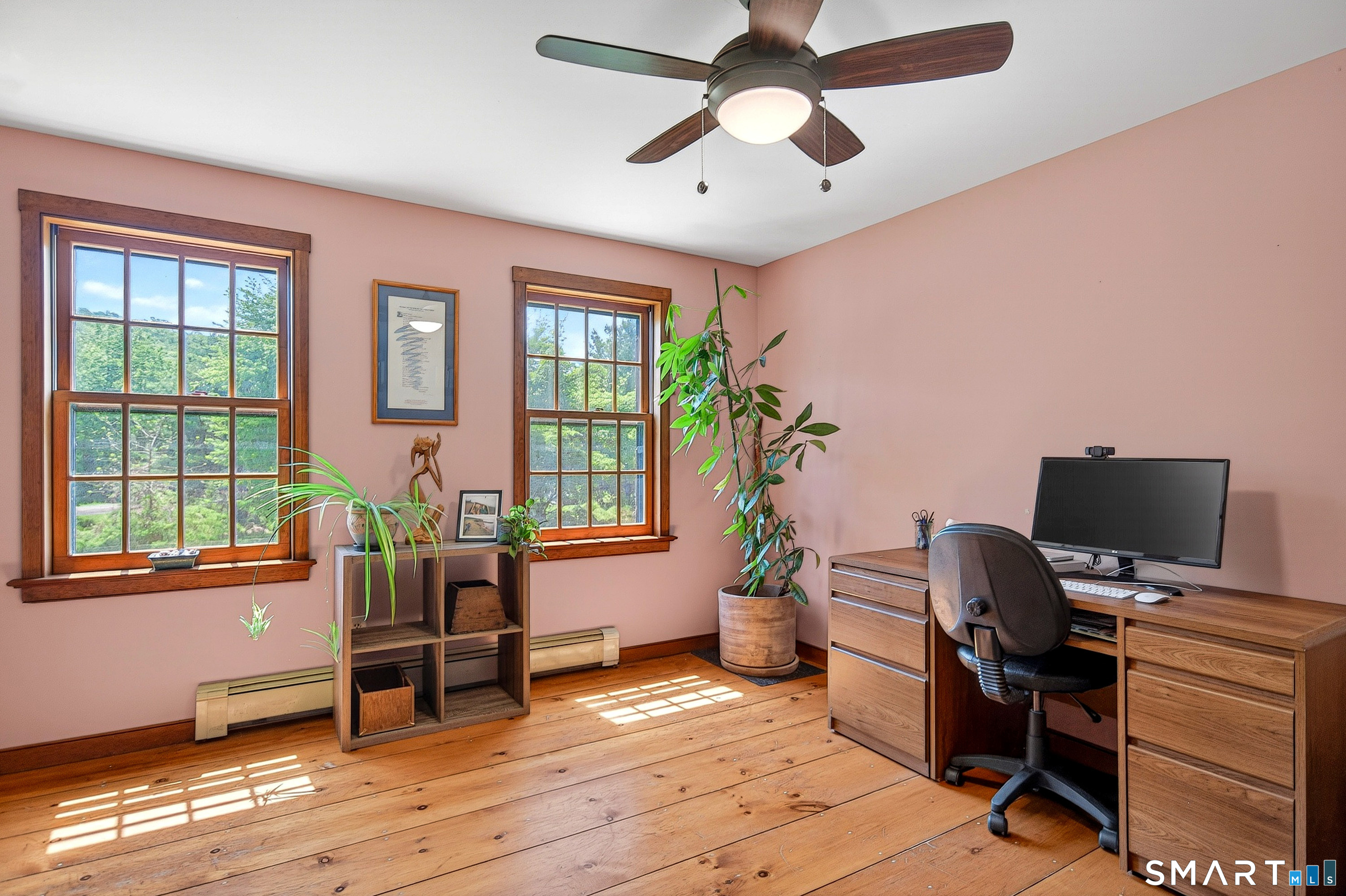 174 Huntingtown Road Newtown, CT 06470 - Photo 5 of 40 a workspace with wooden floor and windows
