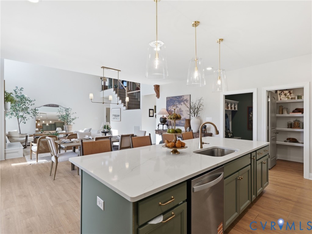 2586 Maidens Road Powhatan, VA 23139 - Photo 8 of 27 a kitchen with a stove a counter top space and living room view