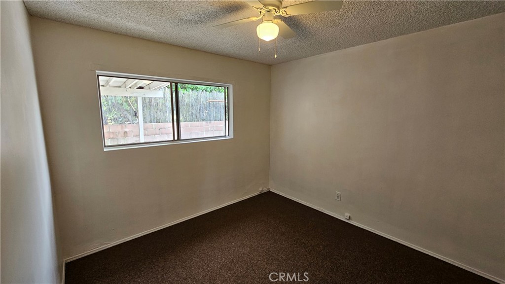 537 Ferris Street Los Angeles, CA 90022 - Photo 11 of 16 an empty room with a window