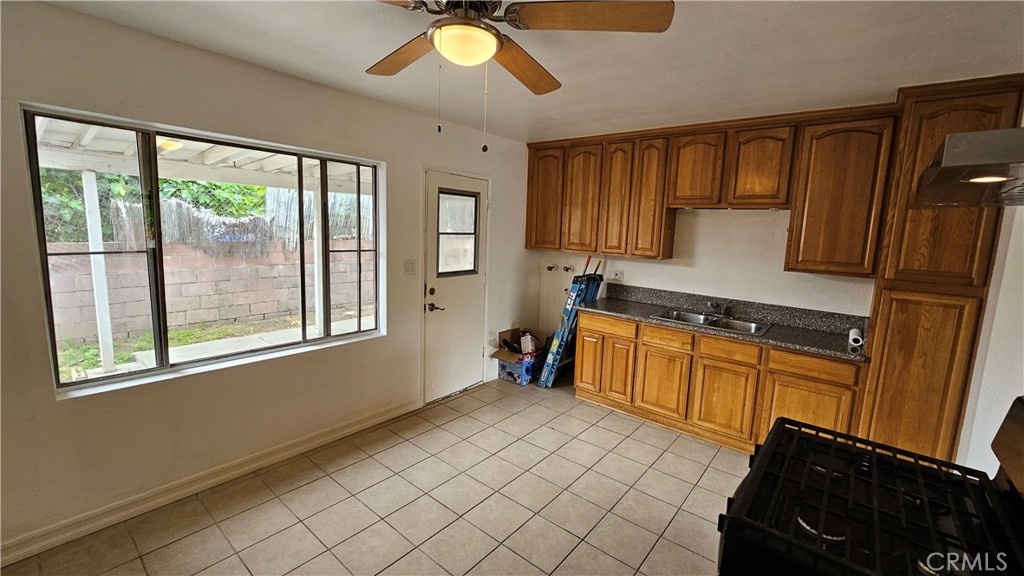 537 Ferris Street Los Angeles, CA 90022 - Photo 16 of 16 a kitchen with stainless steel appliances granite countertop a refrigerator and a sink