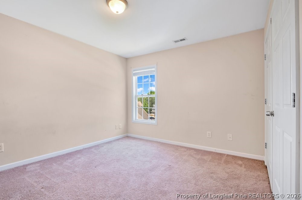 10 Pender Road Spring Lake, NC 28390 - Photo 18 of 35 a view of an empty room with a window