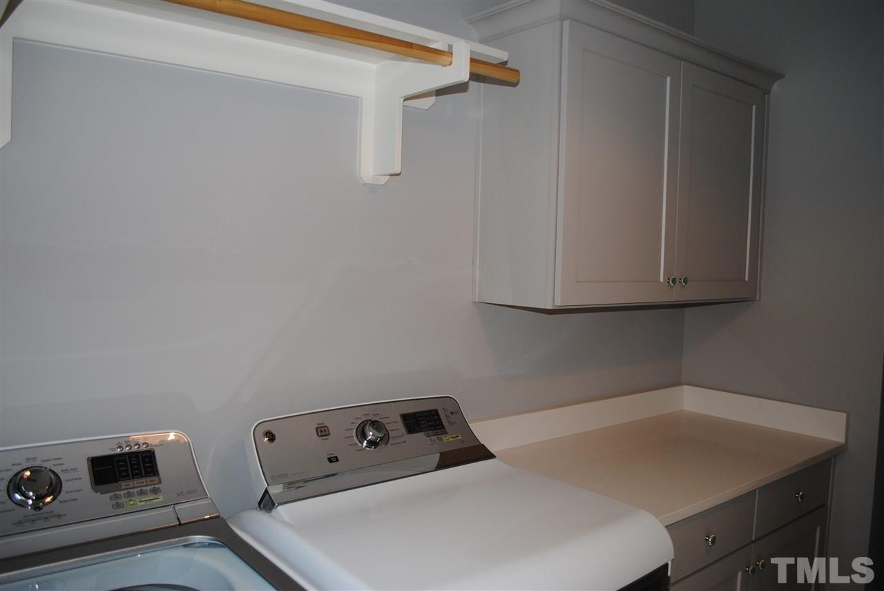 110 Revival Way Raleigh, NC 27608 - Photo 19 of 25 a room with storage and utility