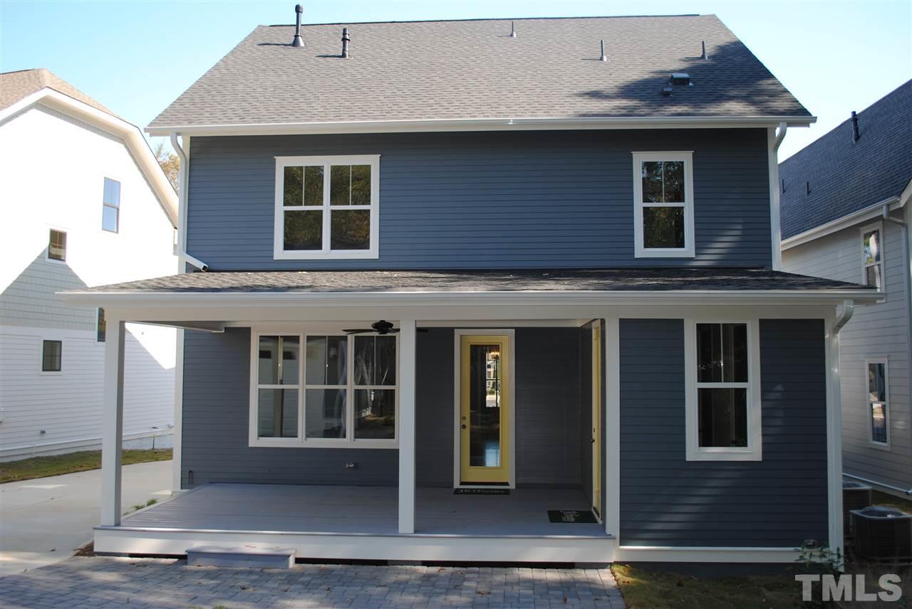 110 Revival Way Raleigh, NC 27608 - Photo 22 of 25 a front view of a house with a garage