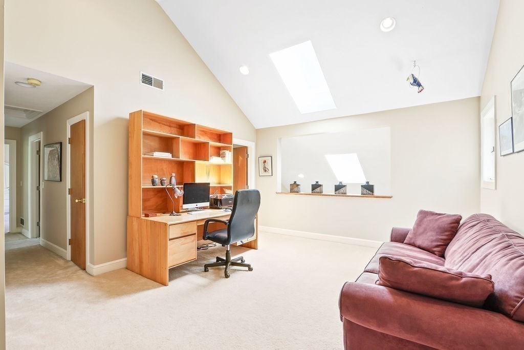 4 Woods End Needham, MA 02492 - Photo 16 of 31 a living room with furniture and a table
