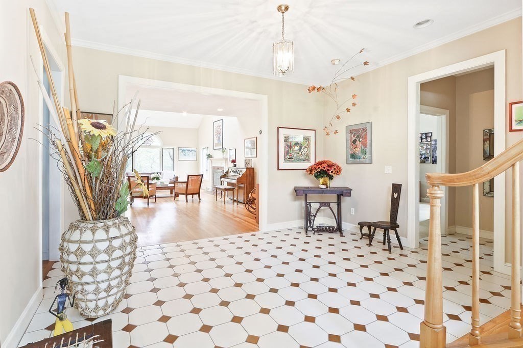 4 Woods End Needham, MA 02492 - Photo 4 of 31 a living room with furniture and a dining table