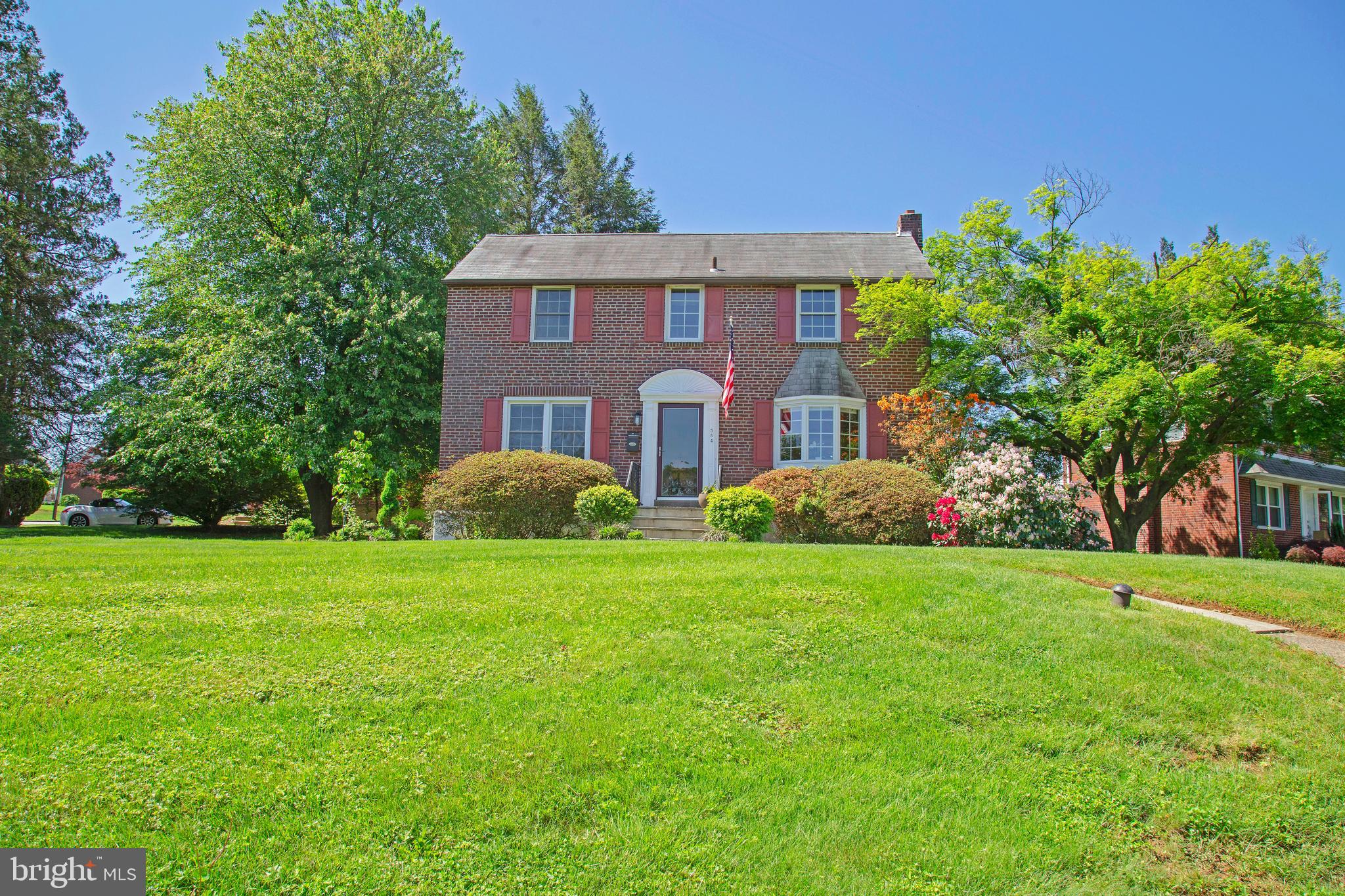 584 Valley View Road Springfield, PA 19064 - Photo 1 of 38 a front view of a house with garden