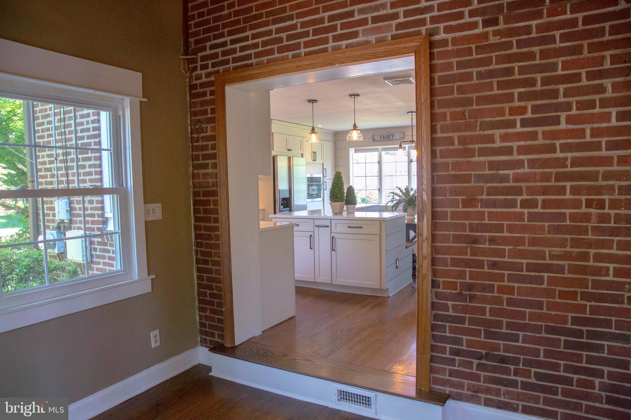 584 Valley View Road Springfield, PA 19064 - Photo 15 of 38 a bathroom with a sink a mirror and a shower