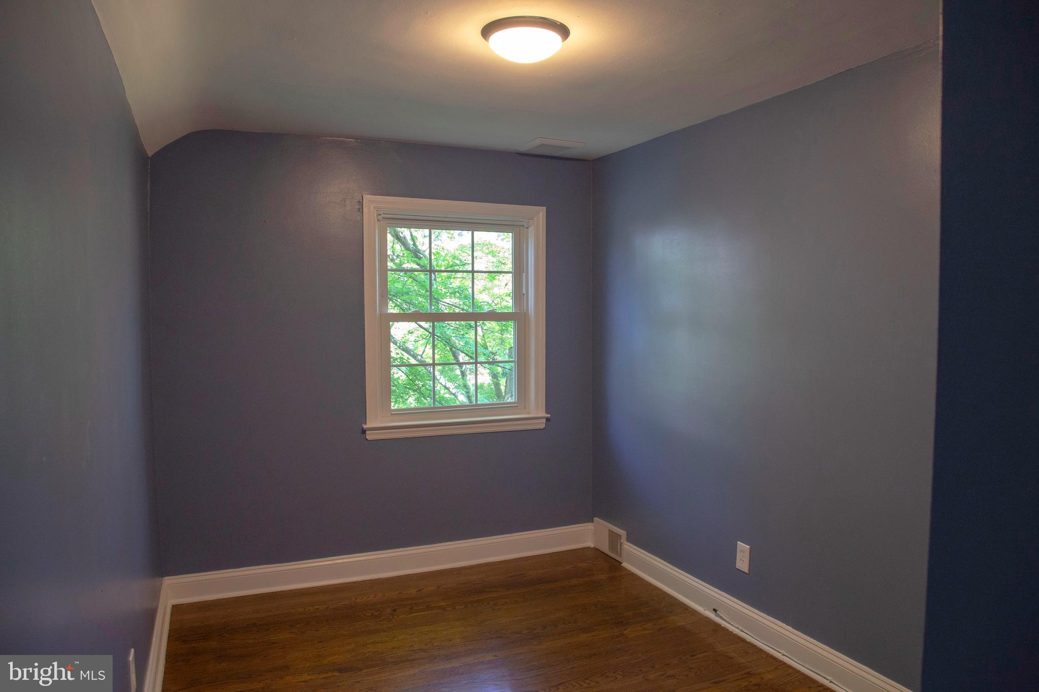 584 Valley View Road Springfield, PA 19064 - Photo 23 of 38 an empty room with a window