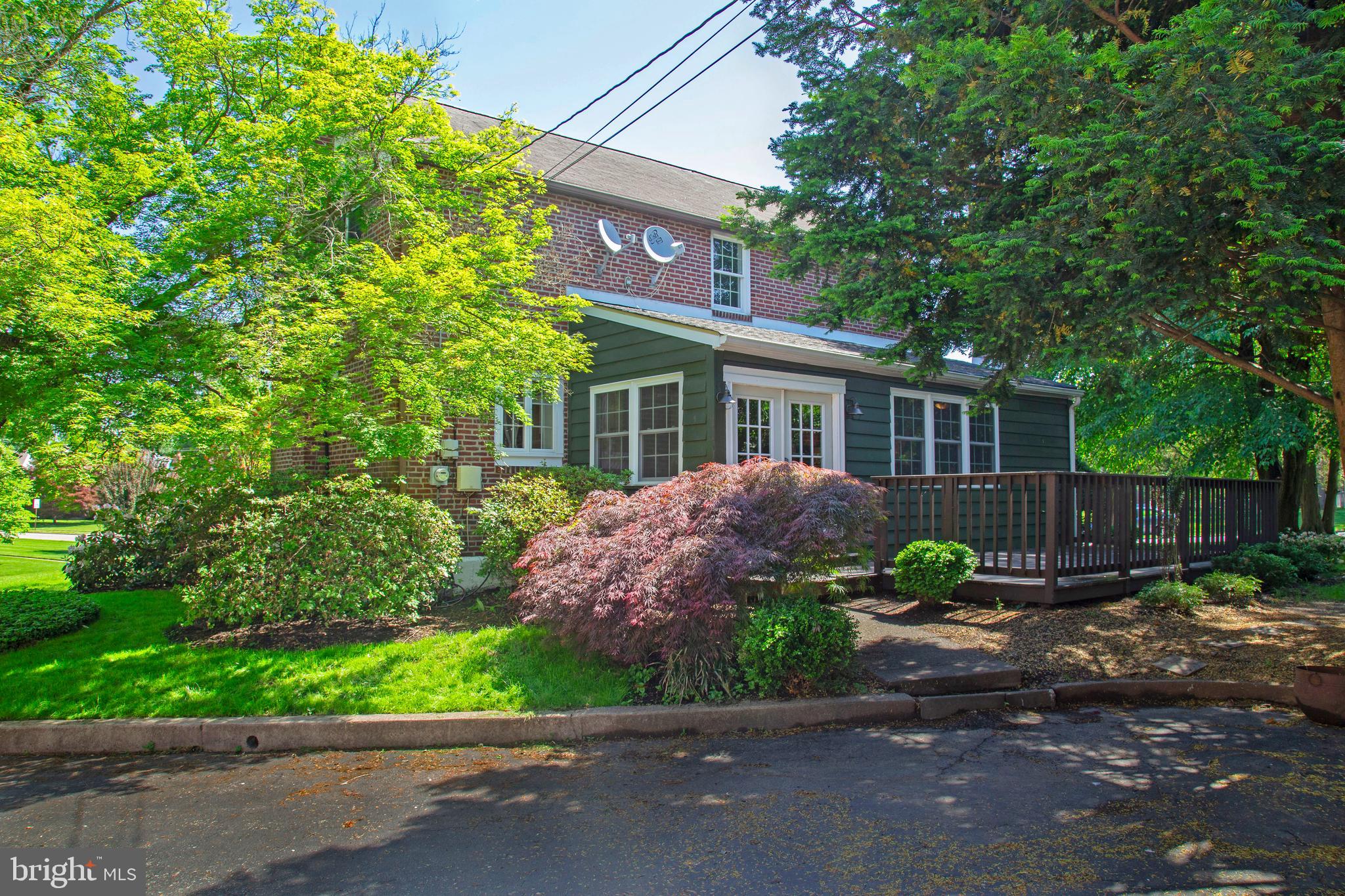 584 Valley View Road Springfield, PA 19064 - Photo 34 of 38 a view of a house with a yard and plants