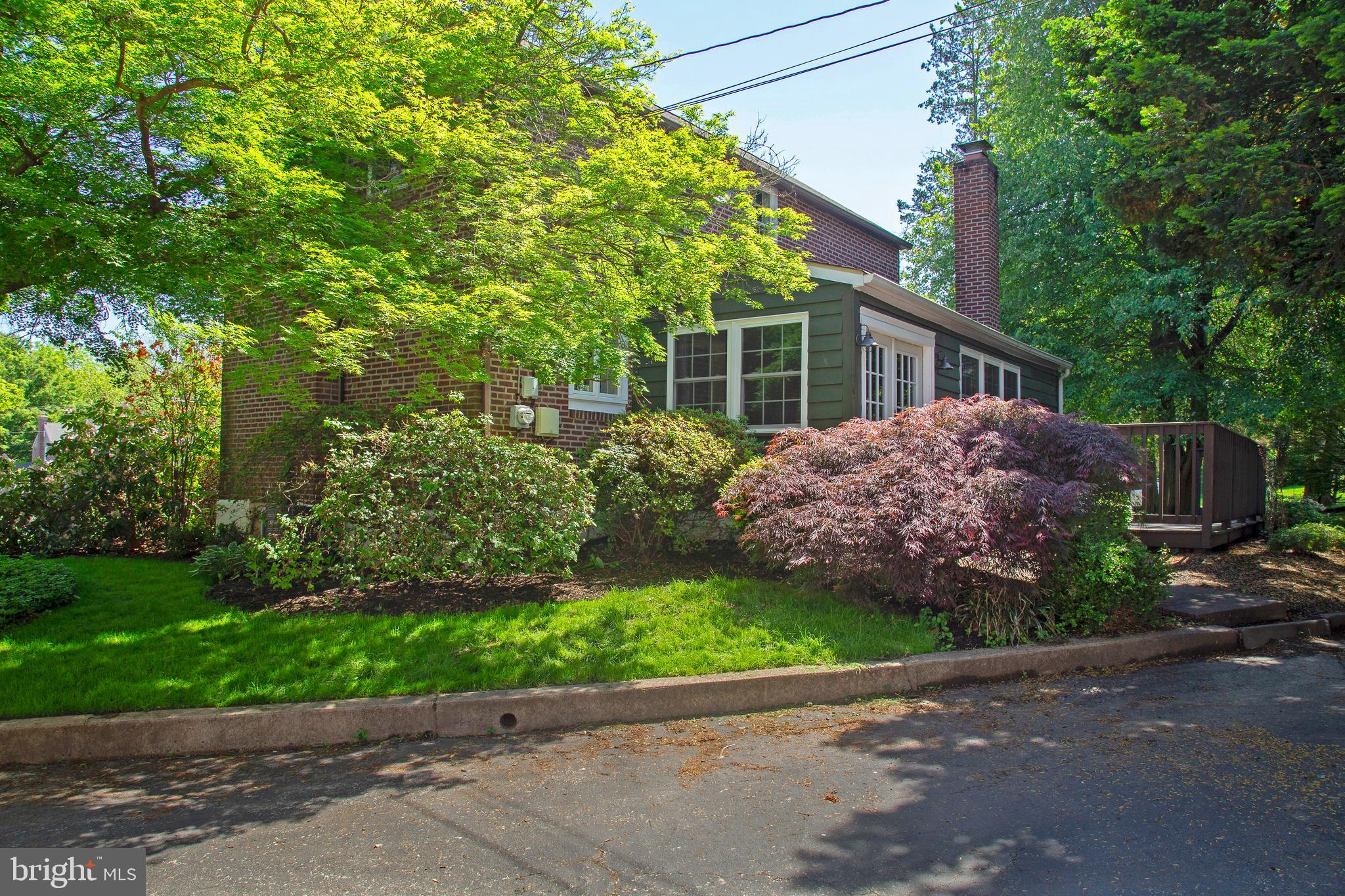 584 Valley View Road Springfield, PA 19064 - Photo 35 of 38 a house with a tree in front of it