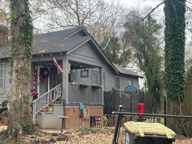 17 Stevens Street Rome, GA 30161 - Photo 3 of 4 a front view of house with deck and seating area
