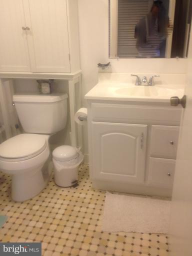 2012 O Street Northwest, Unit 42 Washington, DC 20036 - Photo 13 of 22 a bathroom with a sink toilet and mirror