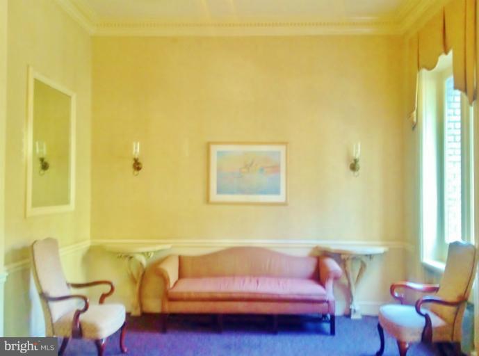 2012 O Street Northwest, Unit 42 Washington, DC 20036 - Photo 16 of 22 a living room with furniture and a window