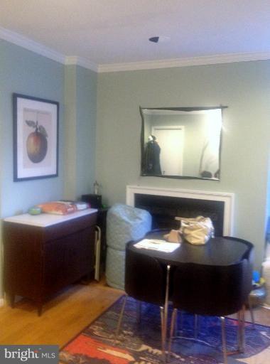 2012 O Street Northwest, Unit 42 Washington, DC 20036 - Photo 18 of 22 a living room with furniture and wooden floor