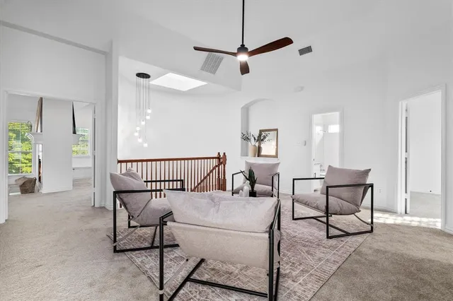 a view of a livingroom with furniture and a rug