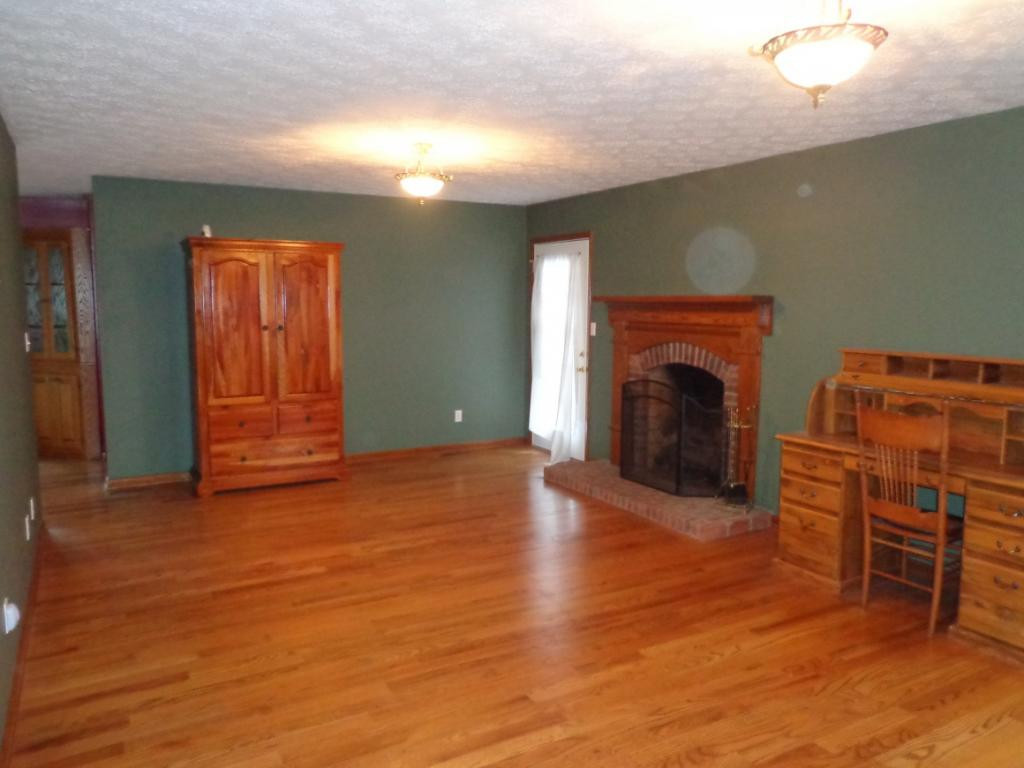 644 Hospital Road Mountain City, TN 37683 - Photo 16 of 35 Brick Fireplace