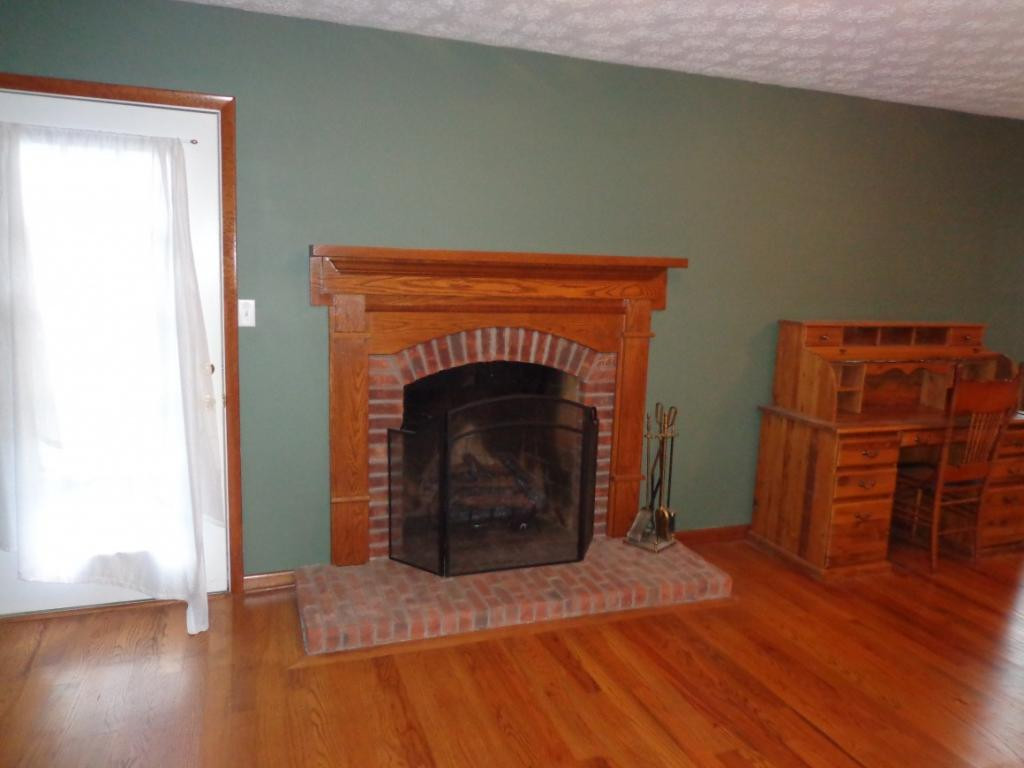 644 Hospital Road Mountain City, TN 37683 - Photo 17 of 35 Brick Fireplace