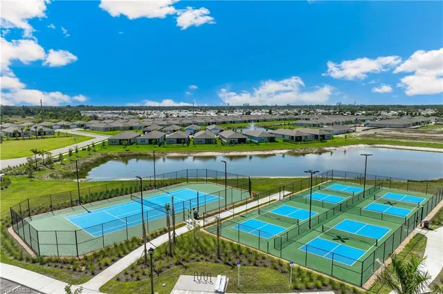 a view of swimming pool with seating area and hardwood floor